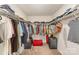 Organized walk-in closet with ample storage space and shelving units at 2893 Yeager Nw Dr, Concord, NC 28027