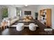 Bright, modern living room with stylish furnishings, hardwood floors, and plenty of natural light at 3026 S Devon St, Charlotte, NC 28213