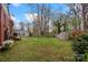 Expansive backyard features a large, grassy area perfect for outdoor activities and entertaining at 304 Simrill Ave, York, SC 29745