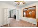 View of the living room featuring french doors and a mirrored window at 304 Simrill Ave, York, SC 29745