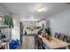 Bright eat-in kitchen features stainless steel appliances, white cabinets, and ample counter space and natural light at 3612 Winterfield Pl, Charlotte, NC 28205