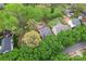 Birds eye view of the residence displaying the fenced backyard with mature trees and lush landscaping at 4020 Brandie Glen Rd, Charlotte, NC 28269