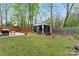 Landscaped backyard featuring a patio, a gazebo, and lush greenery at 4020 Brandie Glen Rd, Charlotte, NC 28269