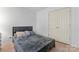 Bright bedroom showcasing a comfy bed with modern style and a closet at 4020 Brandie Glen Rd, Charlotte, NC 28269