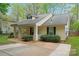Charming single-story home boasts a welcoming front porch and well-maintained landscaping at 4020 Brandie Glen Rd, Charlotte, NC 28269