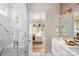 Elegant bathroom featuring a glass-enclosed shower, double vanity, and modern fixtures at 4126 Eastover Glen Rd # 0317, Charlotte, NC 28269
