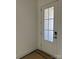 Elegant white entry door with glass panels allowing natural light, enhancing the inviting atmosphere at 4126 Eastover Glen Rd # 0317, Charlotte, NC 28269