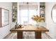 Bright home office with a rustic wooden desk, built-in shelves, and a large window at 4126 Eastover Glen Rd # 0317, Charlotte, NC 28269