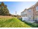 This backyard has a lawn and a fence that offers privacy from neighboring units at 4528 Craigmoss Ln, Charlotte, NC 28278