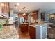 Well-equipped kitchen with granite countertops, stainless steel appliances, and a stylish island at 4924 Riverdale Dr, Charlotte, NC 28273