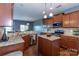 Well-equipped kitchen featuring granite countertops, stainless steel appliances, and a functional layout for culinary creativity at 4924 Riverdale Dr, Charlotte, NC 28273
