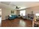 Spacious living room with lots of natural light, hardwood floors and stylish decor at 4924 Riverdale Dr, Charlotte, NC 28273