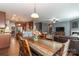 Open living space showcasing a dining area flowing into a kitchen and a comfortable living room at 4924 Riverdale Dr, Charlotte, NC 28273