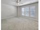 Spacious carpeted bedroom featuring a ceiling fan and a large window at 526 Hunters Dance Rd, Fort Mill, SC 29708