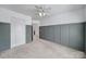 This bedroom boasts neutral carpeting, a wall with trim and a convenient closet at 526 Hunters Dance Rd, Fort Mill, SC 29708