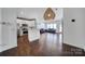 Open concept living space with kitchen and living room with hardwood floors at 526 Hunters Dance Rd, Fort Mill, SC 29708