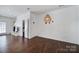 Bright living room featuring modern lighting and hardwood floors at 526 Hunters Dance Rd, Fort Mill, SC 29708