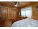 Bright bedroom featuring a comfortable bed, natural light, and ample closet space, perfect for relaxation at 528 Manchester Rd, Mount Gilead, NC 27306