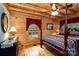 Bedroom featuring wood finishes, natural light, and a cozy, inviting atmosphere for relaxation at 528 Manchester Rd, Mount Gilead, NC 27306