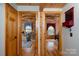 Hallway showcasing access to multiple rooms, highlighting the home's layout and inviting flow at 528 Manchester Rd, Mount Gilead, NC 27306