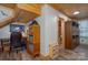 Home office space with wooden bookshelves, wood floors, and adjacent access to the bathroom at 528 Manchester Rd, Mount Gilead, NC 27306