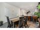 An inviting dining area with an open-concept view into the modern kitchen, perfect for entertaining guests at 532 Billingsley Rd, Charlotte, NC 28211