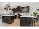 Spacious kitchen featuring stainless steel appliances, large island, and an open-concept design at 532 Billingsley Rd, Charlotte, NC 28211