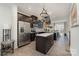Modern kitchen with stainless steel appliances, a center island, and ample cabinet space at 532 Billingsley Rd, Charlotte, NC 28211