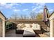 Patio with comfortable seating, umbrella for shade, and a nice view at 532 Billingsley Rd, Charlotte, NC 28211