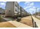Street view of modern townhomes with diverse exterior finishes and well-maintained front yards at 532 Billingsley Rd, Charlotte, NC 28211