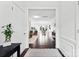 Bright and airy entryway showcasing hardwood floors, neutral walls, and an open floor plan with an inviting view at 5924 Carrollton Ln, Charlotte, NC 28210