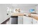 Kitchen with stainless steel appliances, granite countertops, and ample natural light at 5924 Carrollton Ln, Charlotte, NC 28210