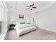 Bright and airy main bedroom with en-suite bathroom and large windows at 5924 Carrollton Ln, Charlotte, NC 28210
