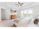 Spacious main bedroom with tray ceiling, large windows, and neutral decor at 5924 Carrollton Ln, Charlotte, NC 28210
