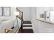 View of stairway leading to upper floor, adjacent to living room at 5924 Carrollton Ln, Charlotte, NC 28210