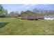 Beautiful backyard with a covered patio perfect for outdoor entertaining at 61 Brown Sw St, Concord, NC 28027