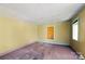 Unfurnished bedroom features neutral wall paint, and hardwood floors at 61 Brown Sw St, Concord, NC 28027