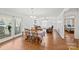 Open concept dining area with seamless flow to kitchen and living room at 61 Brown Sw St, Concord, NC 28027