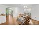 Inviting dining area featuring hardwood floors and abundant natural light at 61 Brown Sw St, Concord, NC 28027