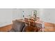 Bright dining area with wood table, seamlessly connected to living space at 61 Brown Sw St, Concord, NC 28027