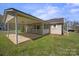 Charming home featuring a large screened porch and a spacious backyard at 61 Brown Sw St, Concord, NC 28027