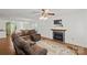 Cozy living room featuring a fireplace and comfortable seating at 61 Brown Sw St, Concord, NC 28027