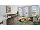 Inviting bedroom with ample natural light, a playful foosball table, and stylish decor creating a cozy atmosphere at 7113 Fowley Rd # 0336, Charlotte, NC 28269
