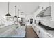 Modern kitchen featuring a large center island, sleek appliances, and elegant marble countertops at 7113 Fowley Rd # 0336, Charlotte, NC 28269