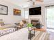 Inviting living room with a fireplace, stylish decor, comfortable seating, and sliding glass doors at 753 Mountainwater Dr, Charlotte, NC 28262