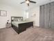 Serene primary bedroom featuring a spacious layout, neutral tones, and ample natural light at 753 Mountainwater Dr, Charlotte, NC 28262