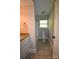 Bathroom with tile flooring, a granite countertop vanity, toilet, tub, and window offering lots of sunlight at 8608 Cedarbrook Dr, Charlotte, NC 28215