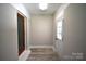 Welcoming entryway with new flooring and plenty of natural light at 8608 Cedarbrook Dr, Charlotte, NC 28215