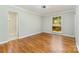 Bedroom with hardwood floors and natural light at 900 E Woodlawn Rd, Charlotte, NC 28209