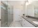 Elegant bathroom featuring glass shower, double vanity with granite counters, and tile floors at 9031 Odell Corners Nw Blvd, Concord, NC 28027
